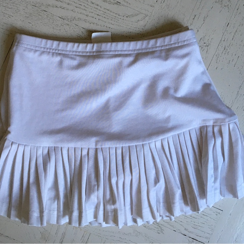 White tennis skirt.